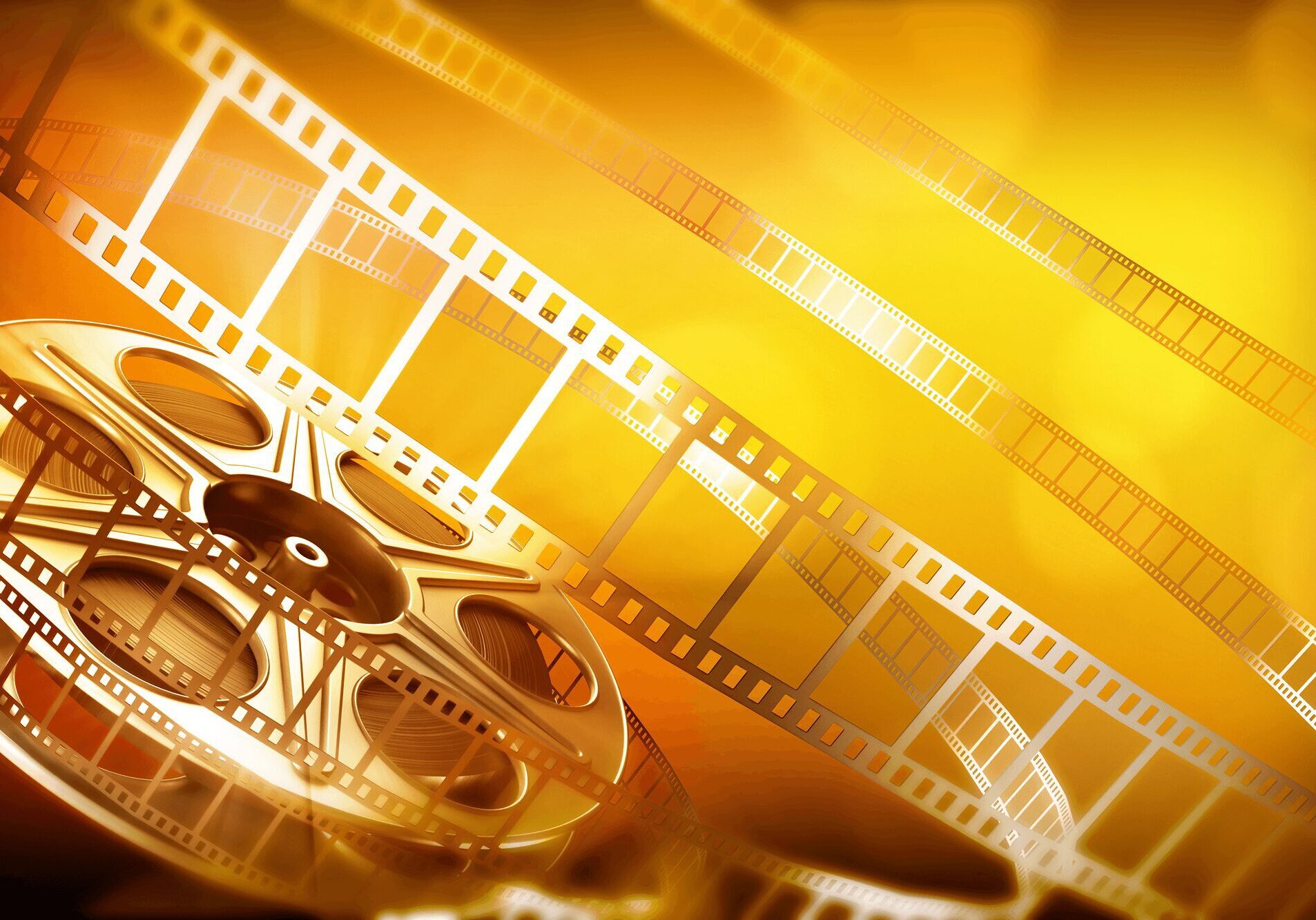 A film reel with several strips of film unwinding against a bright, golden background.